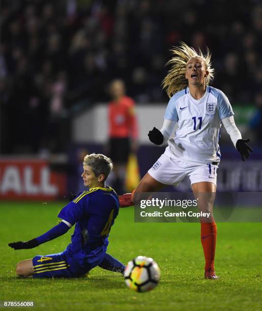 Toni Duggan of England is challenged by Amira Spahic of Bosnia and Herzegovina during the FIFA Women's World Cup Qualifier between England and Bosnia...