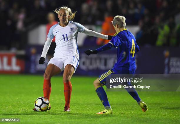 Toni Duggan of England is faced by Amira Spahic of Bosnia and Herzegovina during the FIFA Women's World Cup Qualifier between England and Bosnia and...