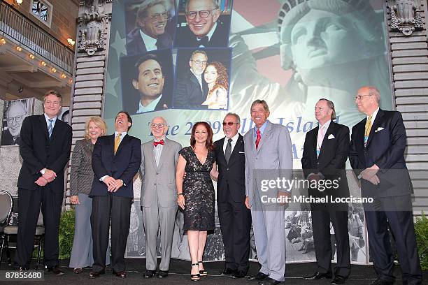 Assistant Secretary of the Interior for Fish and Wildlife and Parks, Thomas Strickland and event host actress Candice Bergen, pose with honorees,...