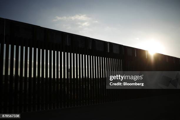 Border fence that separates the U.S. And Mexico stands at sunset in Sunland Park, New Mexico, U.S., on Wednesday, Nov. 8, 2017. If the renegotiation...