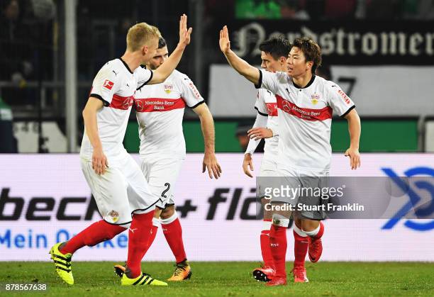 Takuma Asano of VfB Stuttgart is congratulated after scoring a goal during the Bundesliga match between Hannover 96 and VfB Stuttgart at HDI-Arena on...