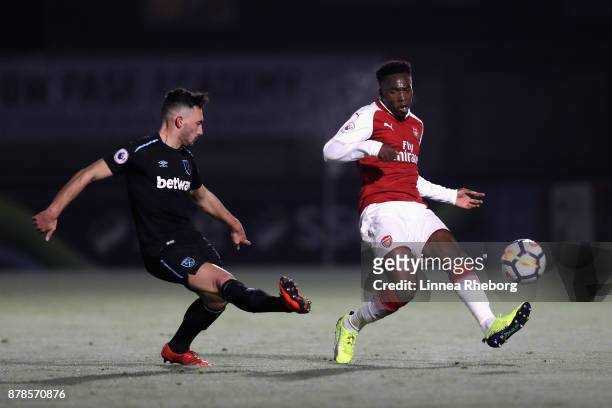 Sead Haksabanovic of West Ham and Tolaji Bola of Arsenal in action during the Premier League 2 match between Arsenal and West Ham United at Meadow...