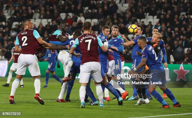 Cheikhou Kouyate of West Ham United scores their first and equalising goal during the Premier League match between West Ham United and Leicester City...
