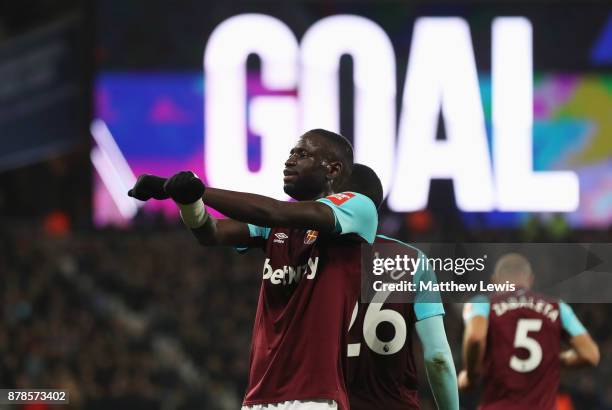Cheikhou Kouyate of West Ham United celebrates as he scores their first and equalising goal during the Premier League match between West Ham United...