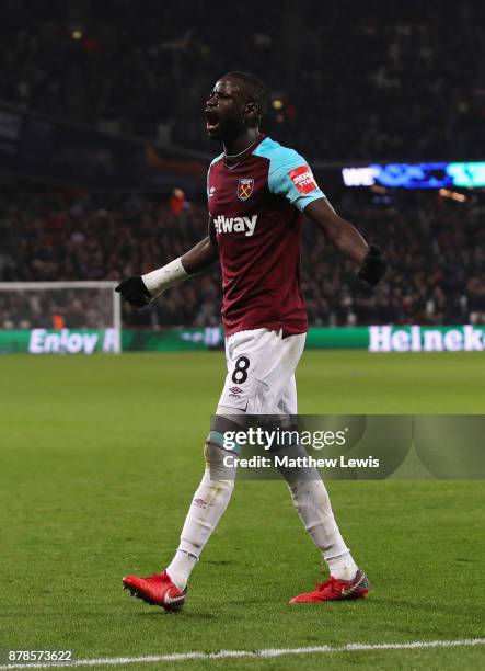 Cheikhou Kouyate of West Ham United celebrates as he scores their first and equalising goal during the Premier League match between West Ham United...