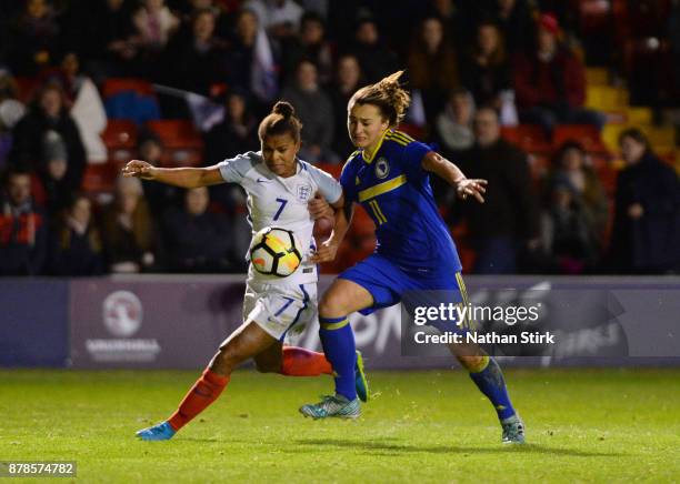 Nikita Parris of England and Liddija Kulis of Bosnia in action during the FIFA Women's World Cup Qualifier between England and Bosnia at Banks'...