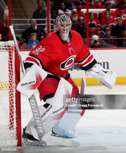 Cam Ward of the Carolina Hurricanes stands tall in the crease during an NHL game against the New York Islanders on November 19, 2017 at PNC Arena in...