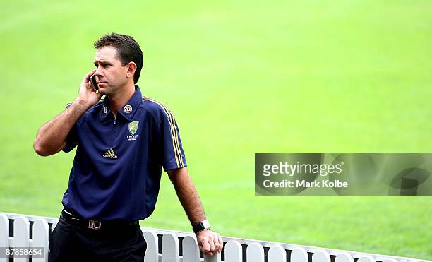 Ricky Ponting speaks on the phone after the announcement of the Australian Ashes squad for the 2009 Tour of England held at Sydney Cricket Ground on...