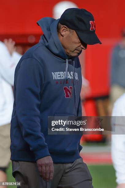 Head coach Mike Riley of the Nebraska Cornhuskers walks the field before the game against the Iowa Hawkeyes at Memorial Stadium on November 24, 2017...