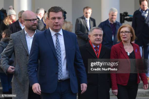 The Leader of the Labour Party, Brendan Howlin , in company of his party collegues including Alan Kelly , walk away after meeting Irish media outside...