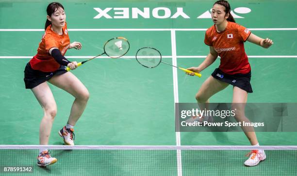 Mayu Matsumoto and Wakana Nagahara of Japan compete against Ha Na Baek and Chae Yoo Jung of South Korea during their women doubles round 32 match of...