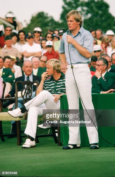 Johnny Miller speaks at the Presentation Ceremony as Jack Nicklaus listens during the 1975 Masters Tournament at Augusta National Golf Club in April...