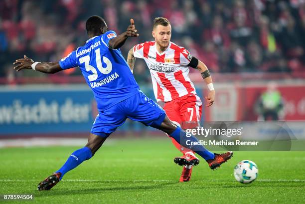 Wilson Kamavuaka of SV Darmstadt 98 and Marcel Hartel of 1 FC Union Berlin during the Second Bundesliga match between Union Berlin and SC Darmstadt...