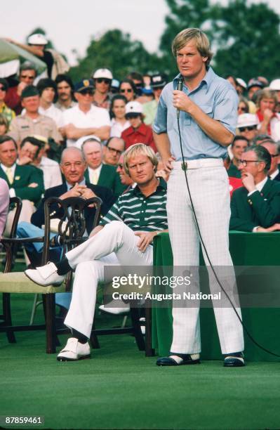 Johnny Miller speaks at the Presentation Ceremony as Jack Nicklaus listens during the 1975 Masters Tournament at Augusta National Golf Club in April...