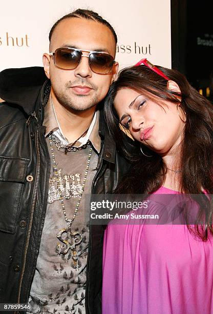 Musician Sean Paul and designer Claw Money attend the launch of Social Sun at Sunglass Hut on May 19, 2009 in New York City.