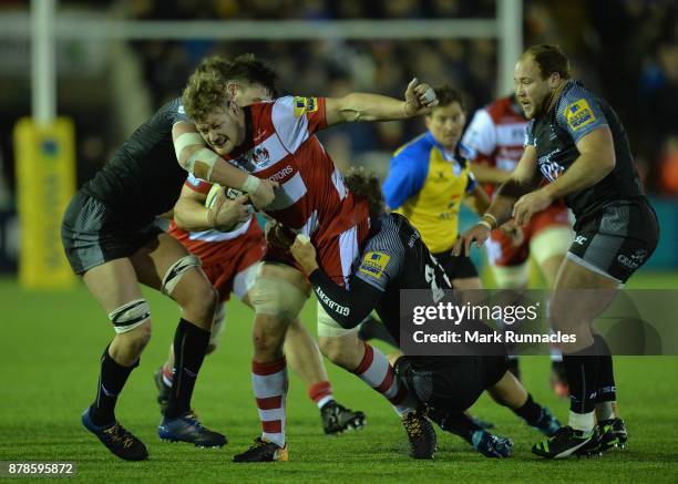 Tom Savage of Gloucester Rugby tries to break through the Newcastle Falcons' defence during the Aviva Premiership match between Newcastle Falcons and...