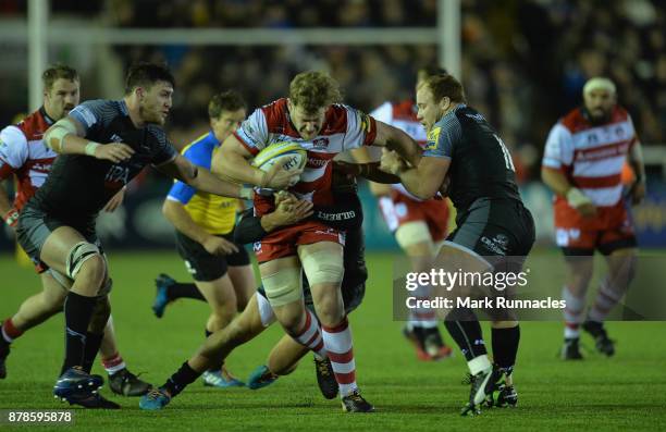 Tom Savage of Gloucester Rugby tries to break through the Newcastle Falcons' defence during the Aviva Premiership match between Newcastle Falcons and...