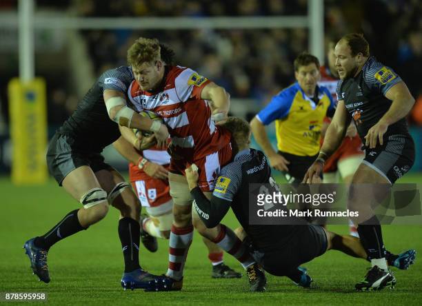 Tom Savage of Gloucester Rugby tries to break through the Newcastle Falcons' defence during the Aviva Premiership match between Newcastle Falcons and...