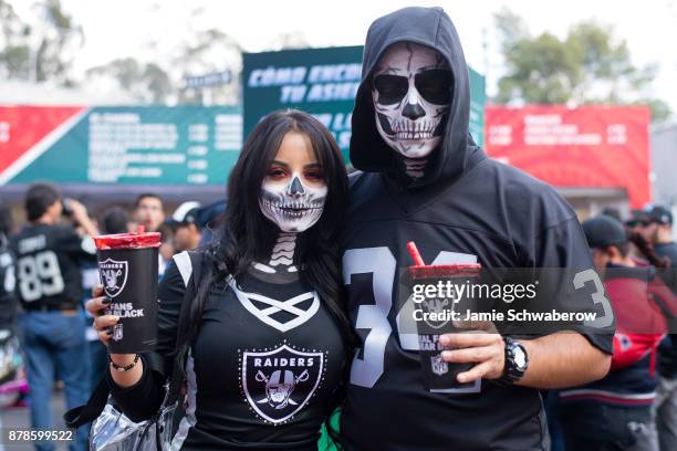 Fans prepare for the game between the New England Patriots and the Oakland Raiders at Estadio Azteca on November 19, 2017 in Mexico City, Mexico.