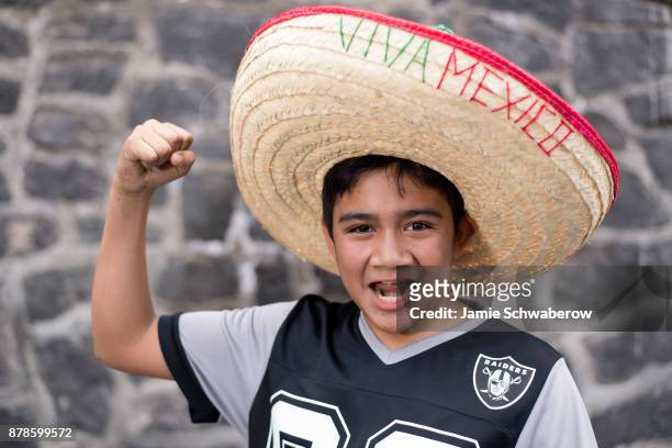 Fans prepare for the game between the New England Patriots and the Oakland Raiders at Estadio Azteca on November 19, 2017 in Mexico City, Mexico.