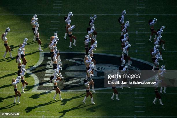 The Oakland Raiderettes dance prior to the game between the New England Patriots and the Oakland Raiders at Estadio Azteca on November 19, 2017 in...