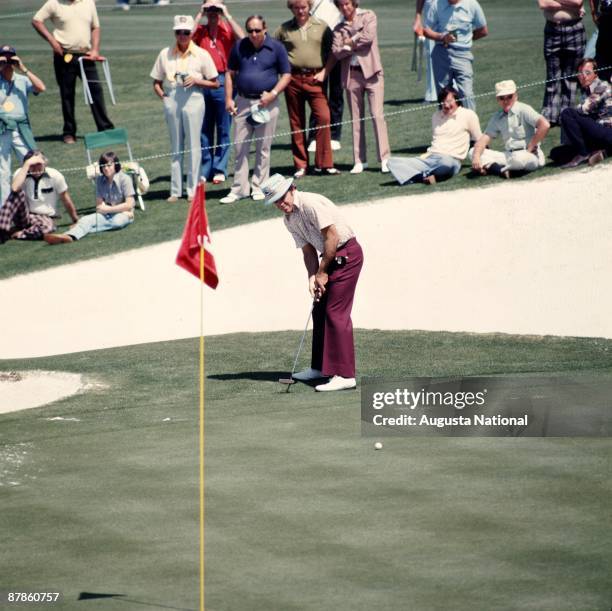 1970s: Jim Colbert watches his putt during a 1970s Masters Tournament at Augusta National Golf Club in April of the 1970s in Augusta, Georgia.