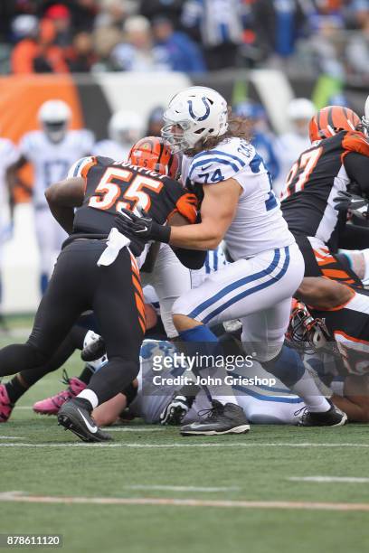Anthony Castonzo of the Indianapolis Colts blocks downfield against Vontaze Burfict of the Cincinnati Bengals during their game at Paul Brown Stadium...