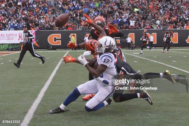 Dre Kirkpatrick of the Cincinnati Bengals battles for the football with T.Y. Hilton of the Indianapolis Colts during their game at Paul Brown Stadium...