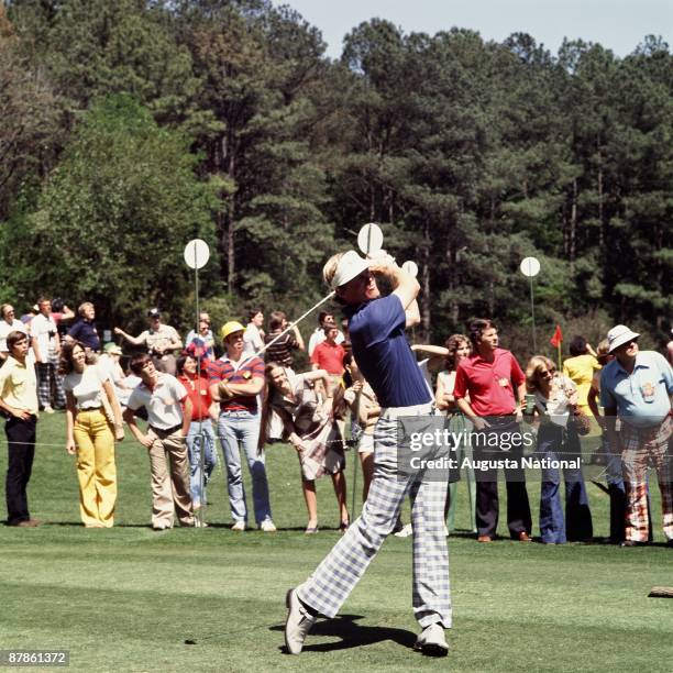 Johnny Miller tees off during the 1977 Masters Tournament at Augusta National Golf Club in April 1977 in Augusta, Georgia.