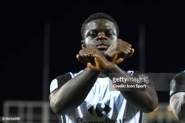 Olivier Kemen of Gazelec celebrates with sign against slavery during the Ligue 2 match between Tours and Gazelec Ajaccio at on November 24, 2017 in...