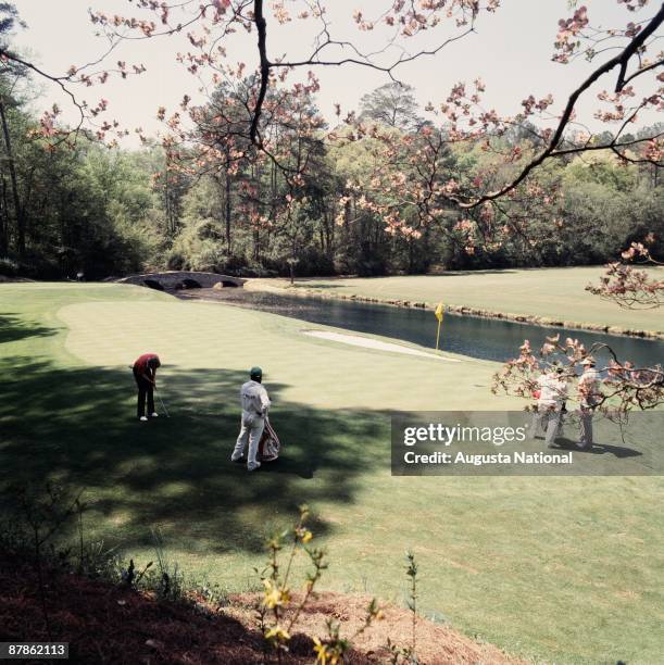 Johnny Miller putts on the 12th green during the 1978 Masters Tournament at Augusta National Golf Club on April 1978 in Augusta, Georgia.