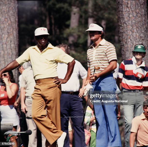 Lee Elder and William Armstrong wait to tee off during the 1978 Masters Tournament at Augusta National Golf Club on April 1978 in Augusta, Georgia.