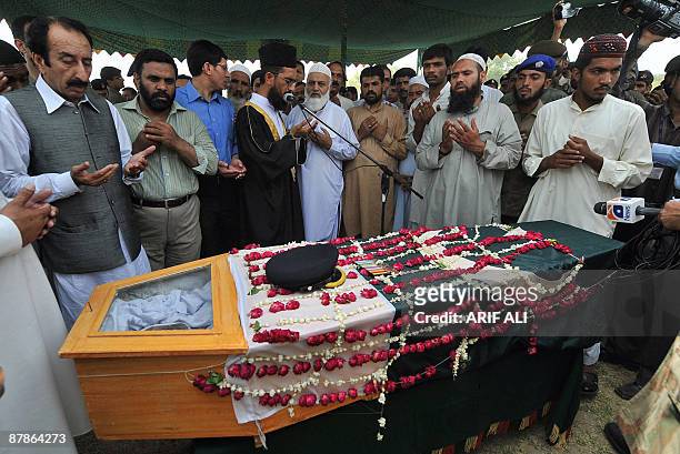 Security forces officials and relatives offer funeral prayers for Pakistan�s army Major Abid Majeed Malik, who was killed in the ongoing operation...