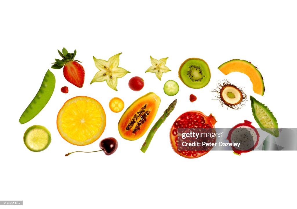 Fresh fruit and vegetables on white background.