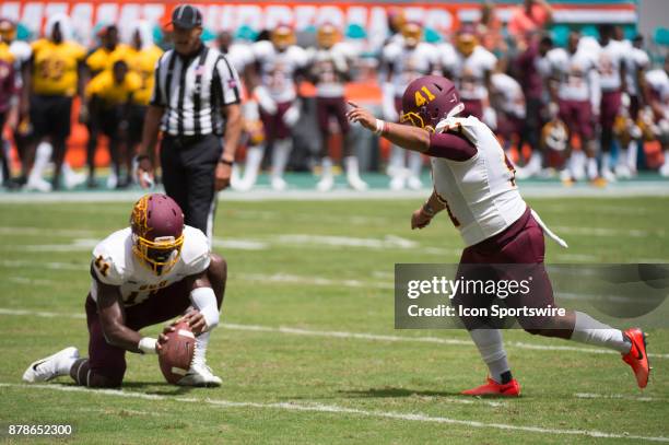 Bethune-Cookman Wildcats Kicker Uriel Hernandez attempts a field goal as Bethune-Cookman Wildcats Wide Receiver Anthony Cruz holds the ball during...