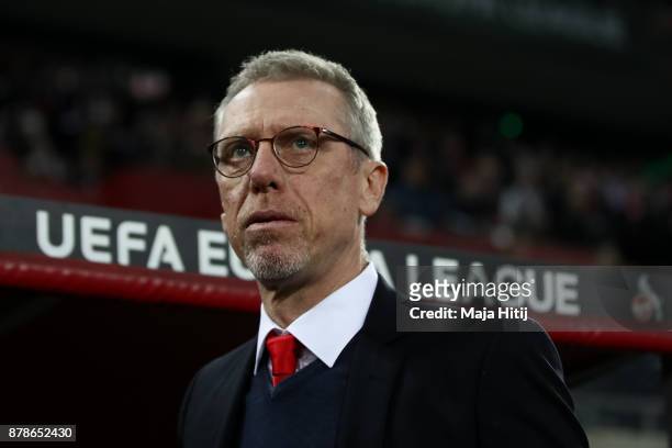 Coach Peter Stoeger of Koeln looks on prior the UEFA Europa League group H match between 1. FC Koeln and Arsenal FC at RheinEnergieStadion on...