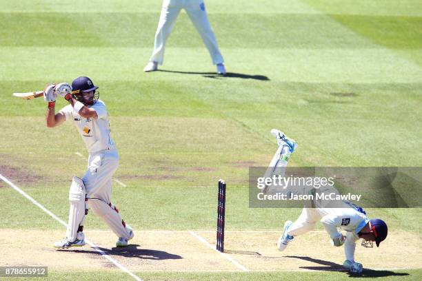 Glenn Maxwell of Victoria hits the ball past Peter Nevill of NSW during day two of the Sheffield Shield match between New South Wales and Victoria at...