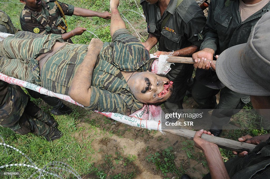 SRI LANKA OUT  Sri Lankan soldiers carry