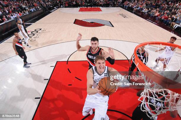 Timofey Mozgov of the Brooklyn Nets goes for a lay up against the Portland Trail Blazers on November 10, 2017 at the Moda Center in Portland, Oregon....