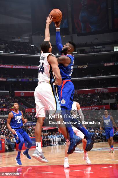Willie Reed of the LA Clippers and Brandan Wright of the Memphis Grizzlies go for the ball on November 4, 2017 at STAPLES Center in Los Angeles,...