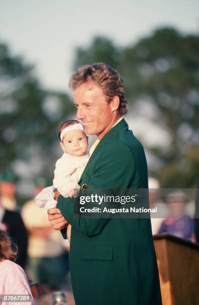 Masters Champion Bernhard Langer holds his daughter Christina at the Presentation Ceremony during the 1993 Masters Tournament at Augusta National...