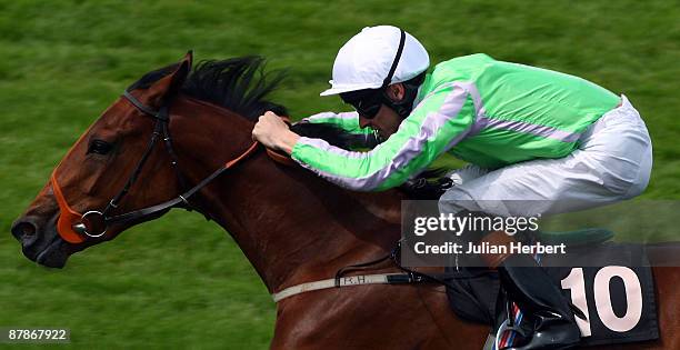 Richard Hughes and La Panterta land The E.B.F. Cucumber Maiden Fillies' Stakes Race run at Goodwood Racecourse on May 20, 2009 in Chichester, England.