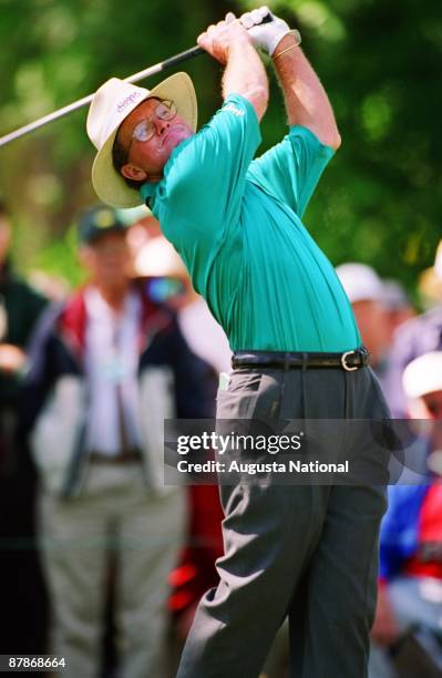 Tom Kite watches his shot from the tee box during the 1997 Masters Tournament at Augusta National Golf Club in April 1997 in Augusta, Georgia.