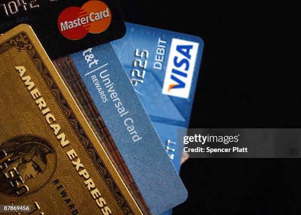 In this photo illustration, major U.S. Credit cards are seen on May 20, 2009 in New York City. In new landmark credit card legislation, the United...