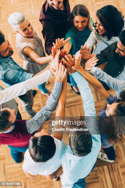 teamwork - community events stock pictures, royalty-free photos & images