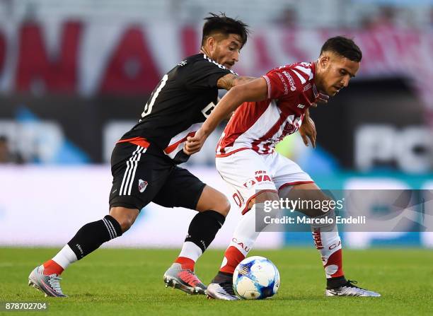 Milton Casco of River Plate fights for ball with Franco Fragapane of Union during a match between River and Union as part of Superliga 2017/18 at...