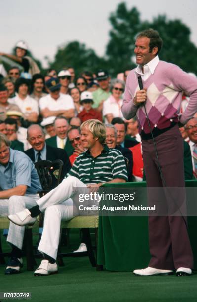 Tom Weiskopf speaks at the Presentation Ceremony while Jack Nicklaus and Johnny Miller listen after the 1975 Masters Tournament at Augusta National...