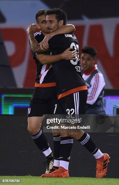 Rafael Santos Borre of River Plate celebrates with teammate Ignacio Scocco after scoring the first goal of his team during a match between River and...