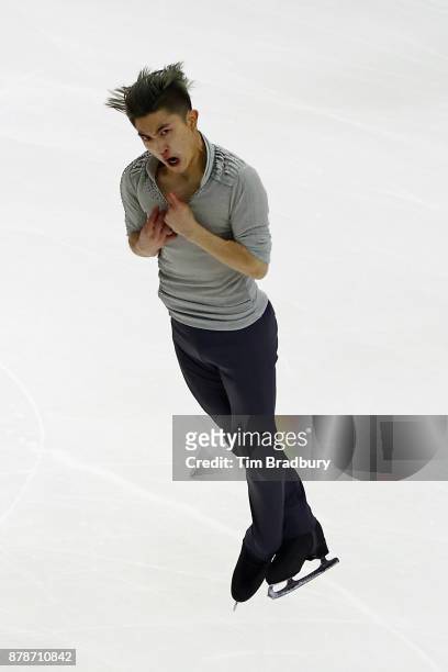 Han Yan of China competes in the Men's Short Program during day one of 2017 Bridgestone Skate America at Herb Brooks Arena on November 24, 2017 in...
