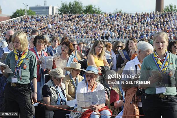 Participants in a protestant church congress sing in the northern German city of Bremen on May 20, 2009. The church congress themed "Man, where are...